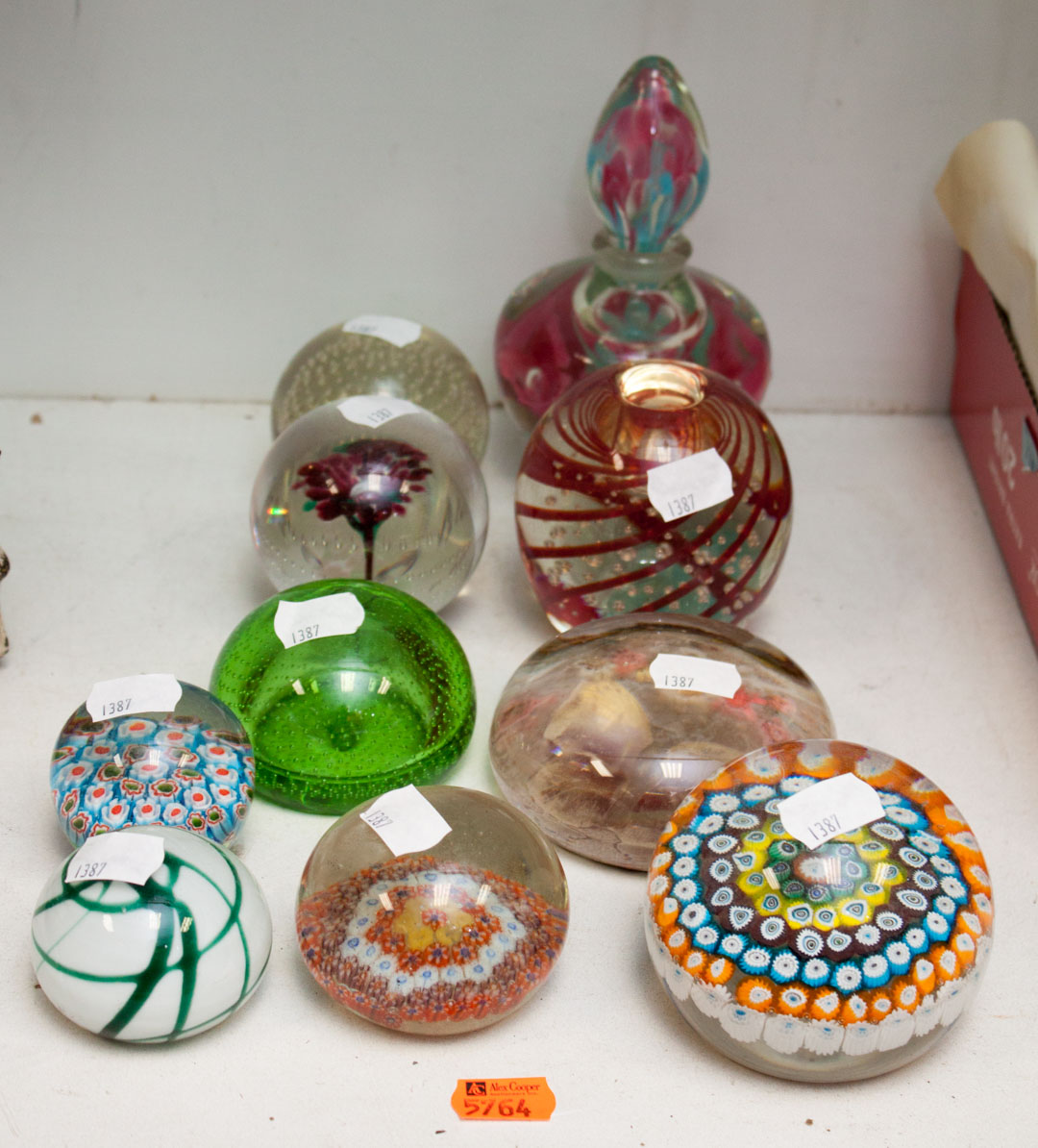 Appraisal: Glass paperweights and perfume bottle