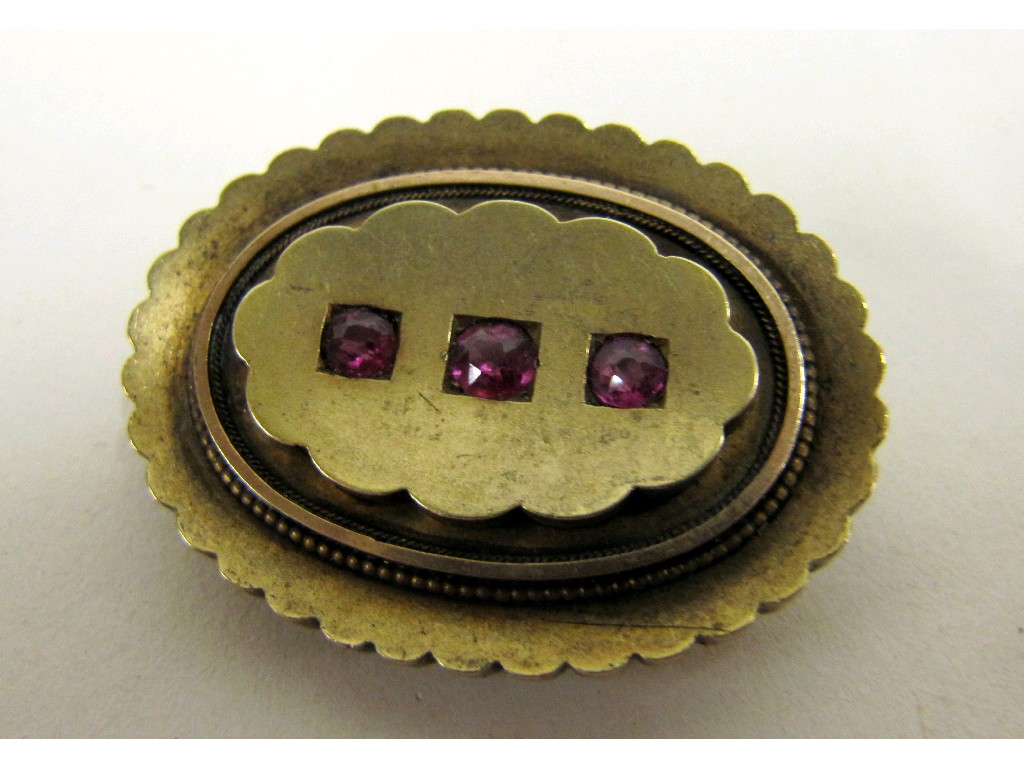 Appraisal: Victorian unmarked gold remembrance brooch with three pink tourmaline insets