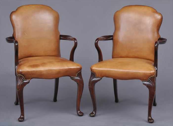 Appraisal: PAIR OF QUEEN ANNE-STYLE CARVED MAHOGANY ARMCHAIRS Each shaped back