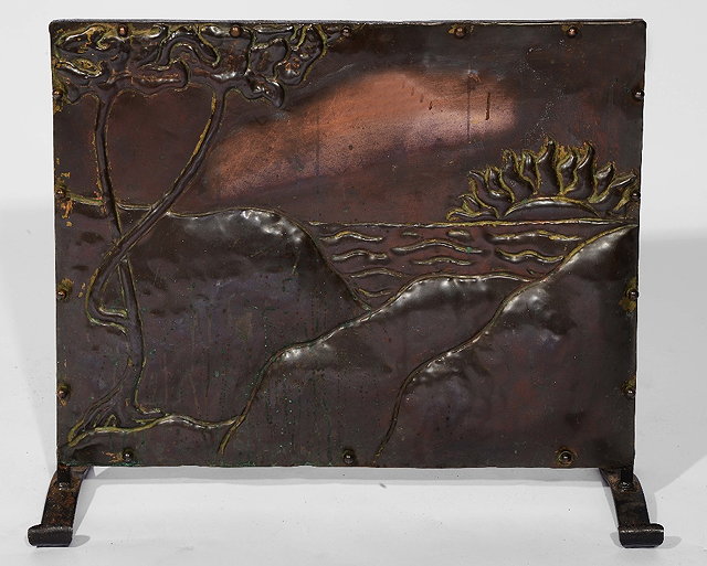 Appraisal: An Arts Crafts copper fire screenshowing a sun setting over