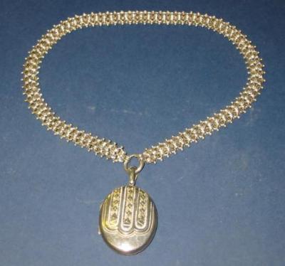 Appraisal: A VICTORIAN SILVER LOCKET AND COLLAR with applied beading the