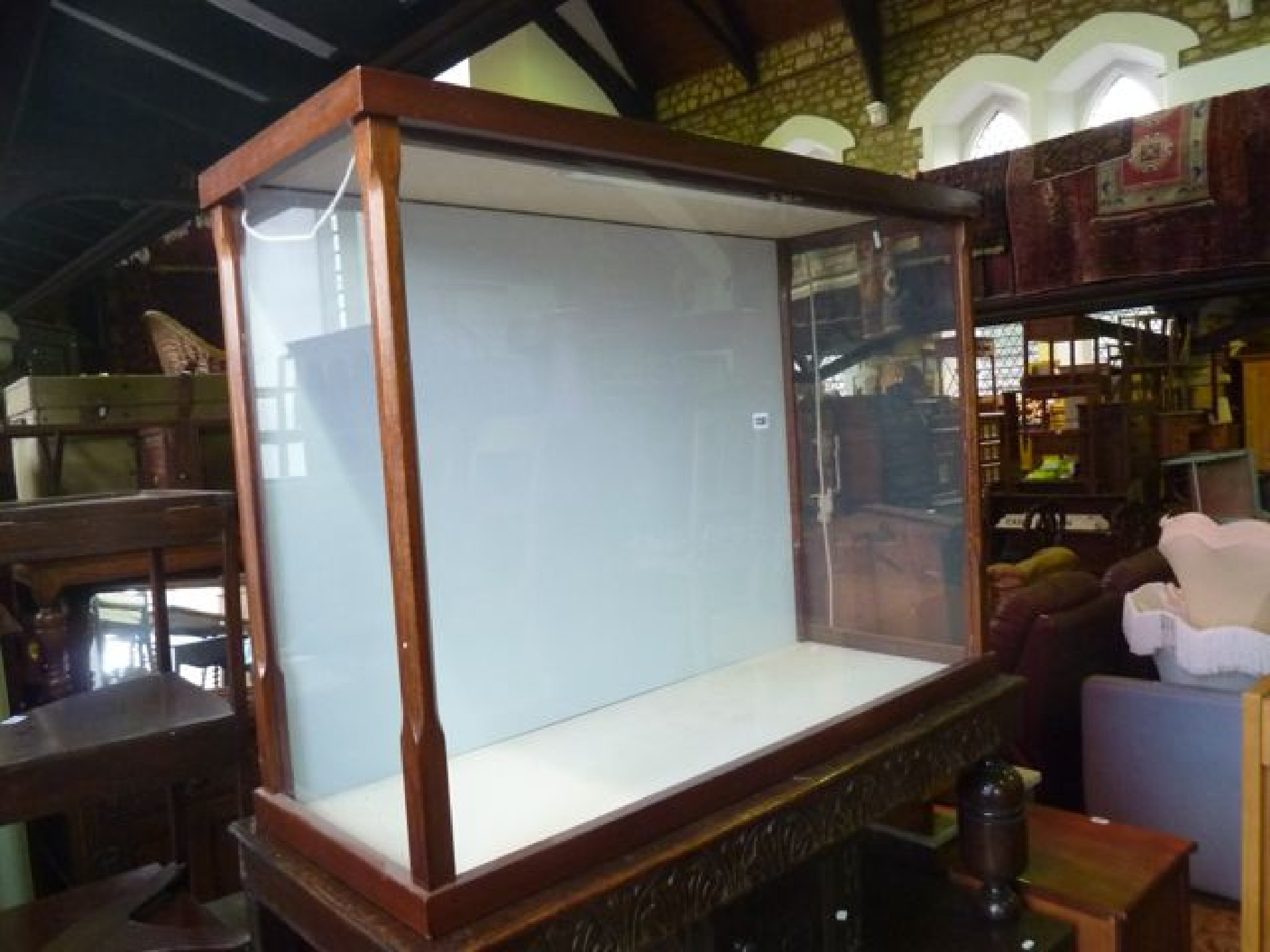 Appraisal: A large display case table counter top of rectangular form