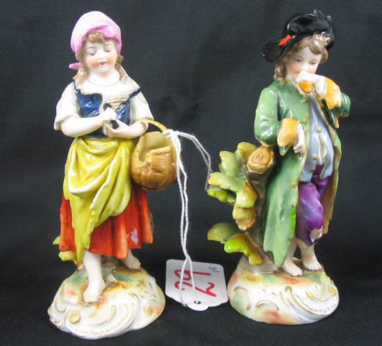 Appraisal: PAIR GERMAN KLOSTER-VEILSDORF PORCELAIN FIGURES hand painted a woman carrying