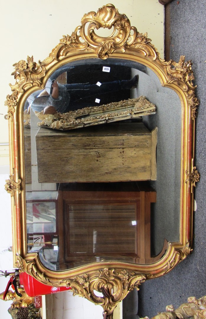 Appraisal: A late th century French gilt framed wall mirror with