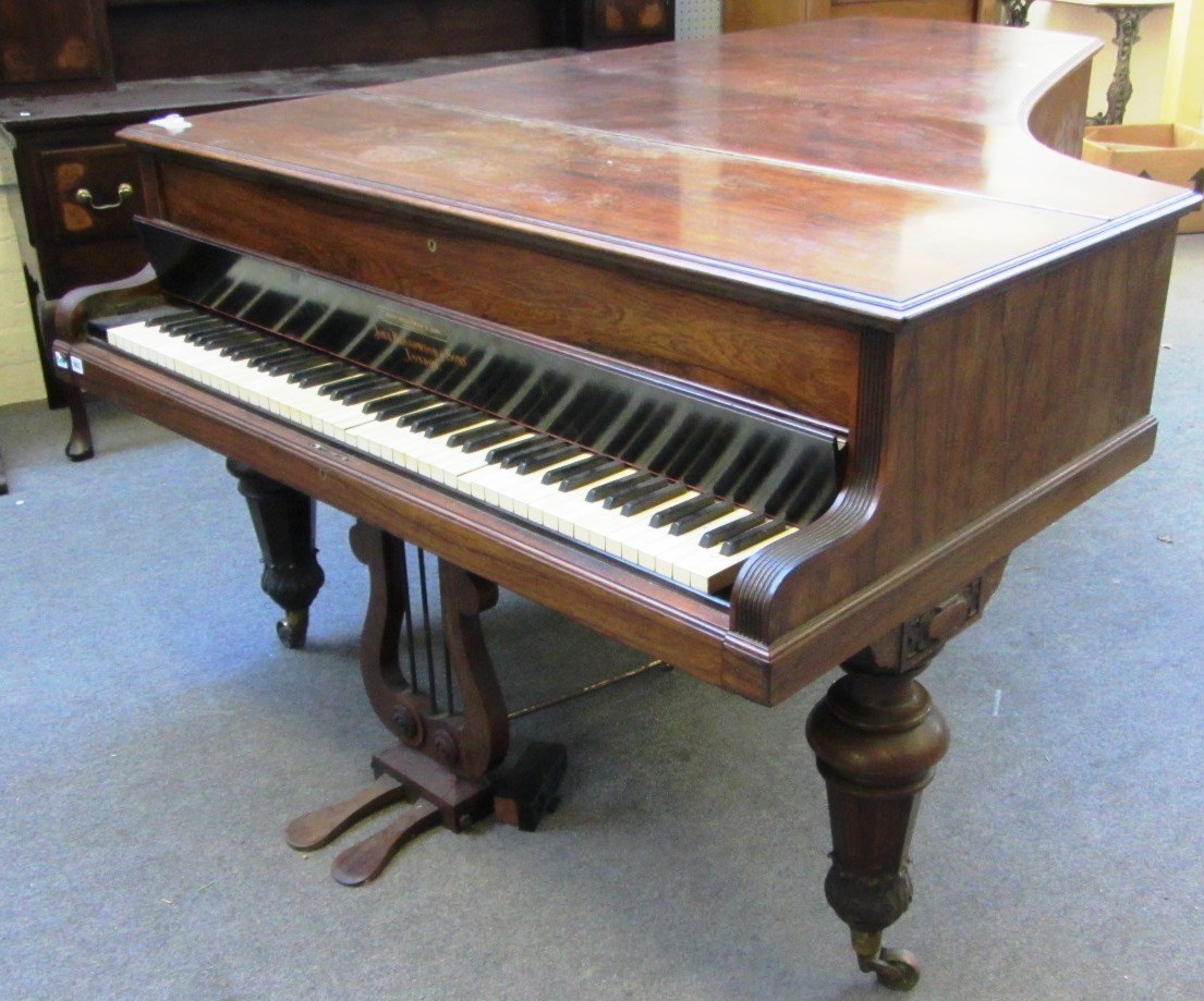 Appraisal: A rosewood iron framed grand piano by 'John Broadwood Sons