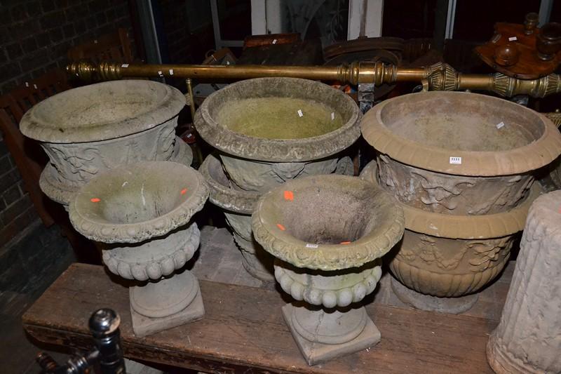 Appraisal: SEVEN LARGE CLASSICAL SYLE CONCRETE POTS SEVEN LARGE CLASSICAL SYLE