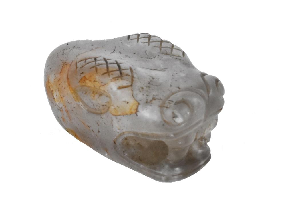 Appraisal: PRE-COLUMBIAN STYLE ROCK CRYSTAL SERPENT HEADThe transparent serpents head with