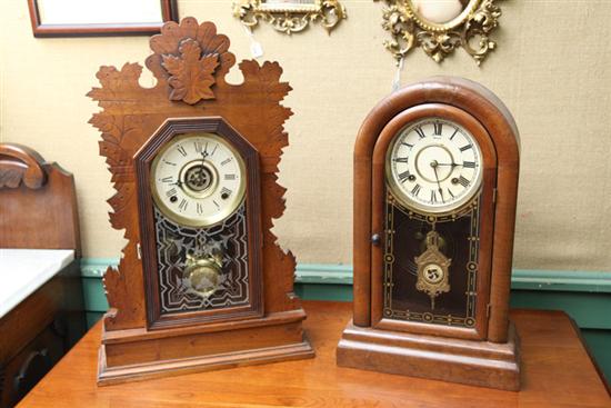 Appraisal: TWO SHELF CLOCKS An eight day New Haven clock with