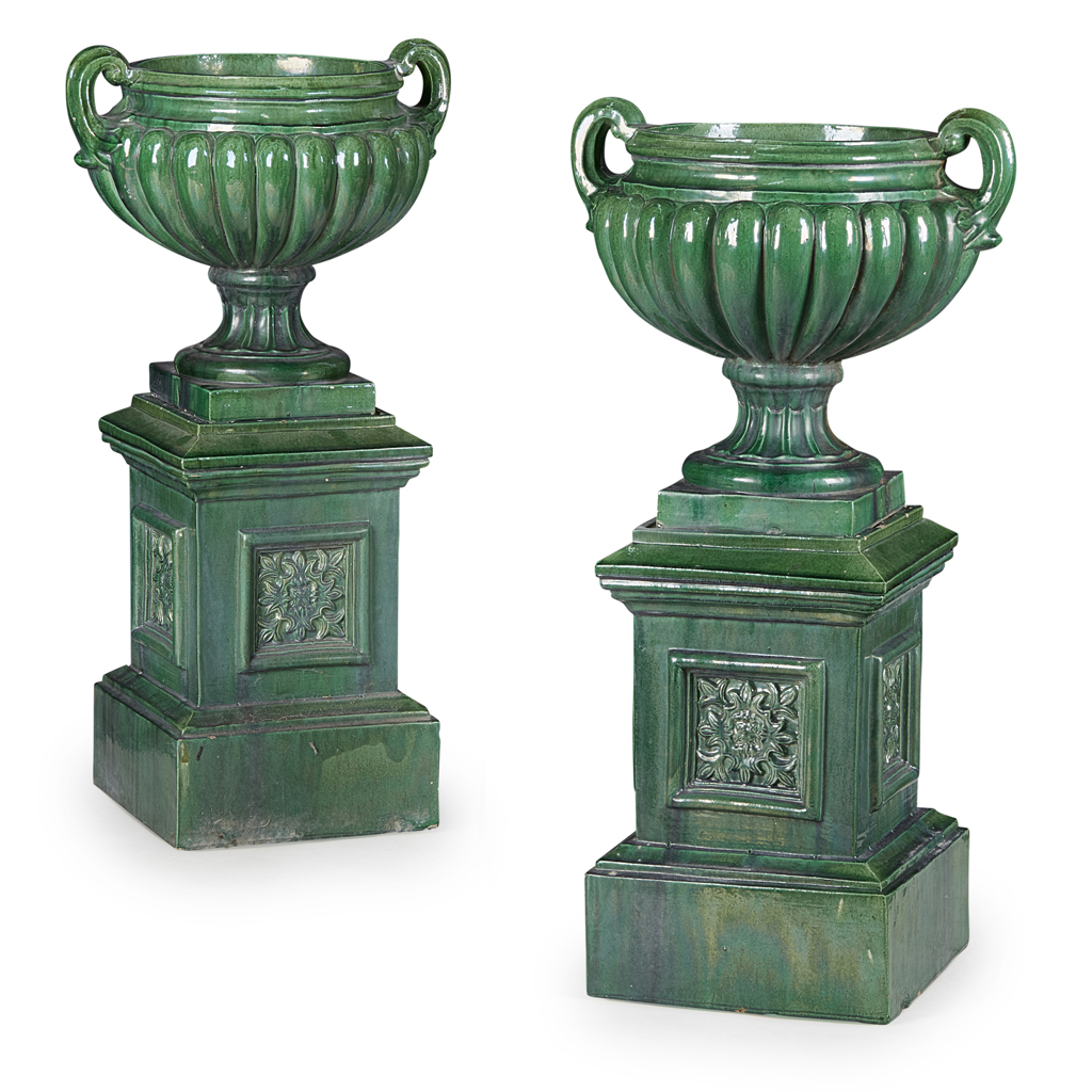 Appraisal: PAIR OF GLAZED FIRECLAY URNS AND STANDS LATE TH EARLY