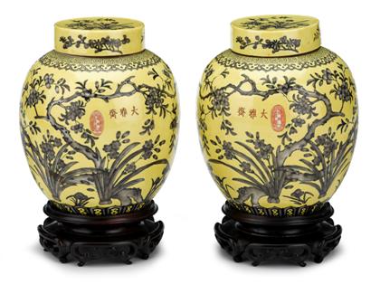 Appraisal: Pair of Chinese yellow ground Dayazhai covered porcelain jarsearly th