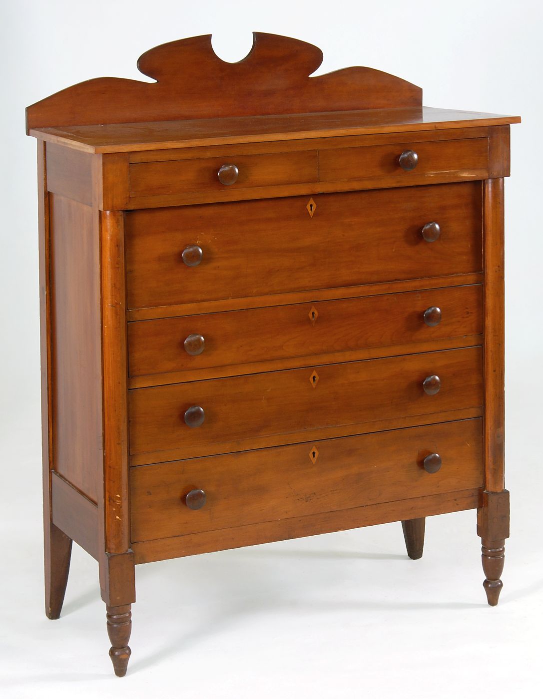 Appraisal: SIX-DRAWER BUREAU Early th CenturyIn cherry with shaped back splash