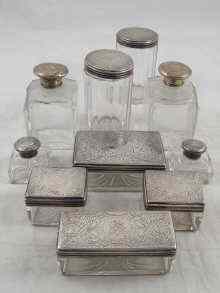 Appraisal: A group of ten cut glass dressing table jars with