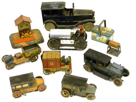 Appraisal: Assortment of tin toys ten pieces early coupe '' h