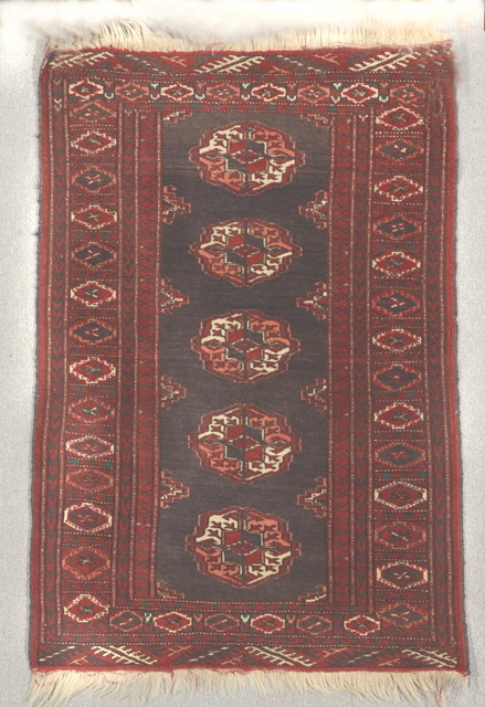 Appraisal: A TURKISH BERGAMA PRAYER MAT the central diamond motif within