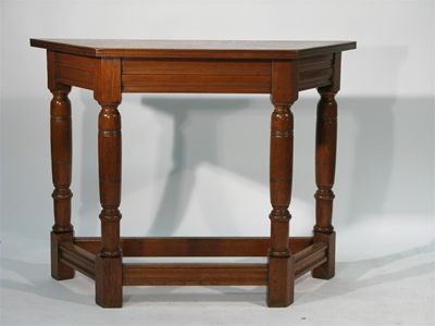 Appraisal: A large oak hall table chamfered top with turned legs