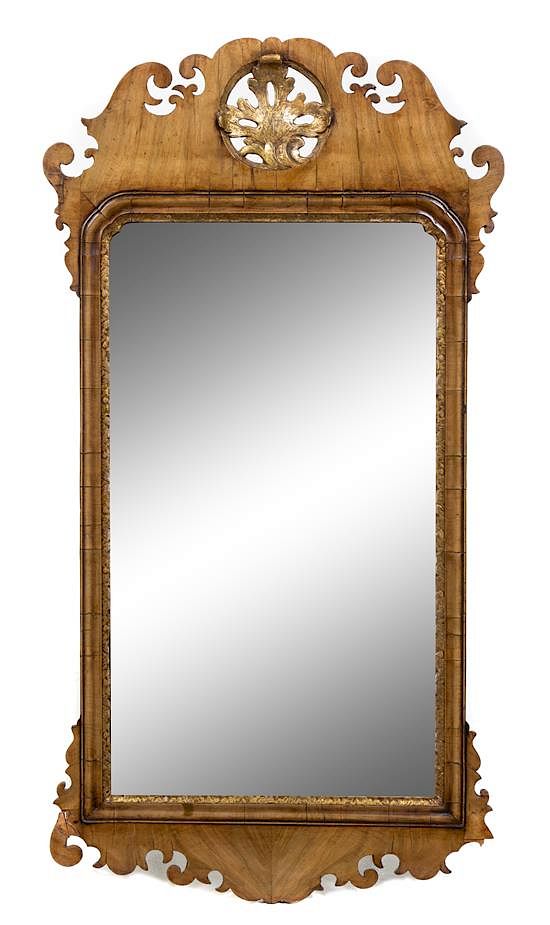 Appraisal: A George III Style Parcel Gilt Mahogany Mirror Height x