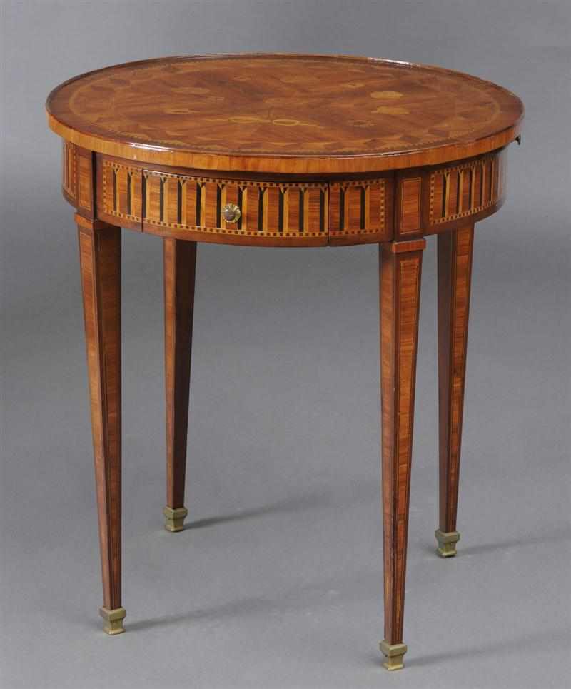 Appraisal: LOUIS XVI STYLE MARQUETRY-INLAID TULIPWOOD SIDE TABLE The circular top