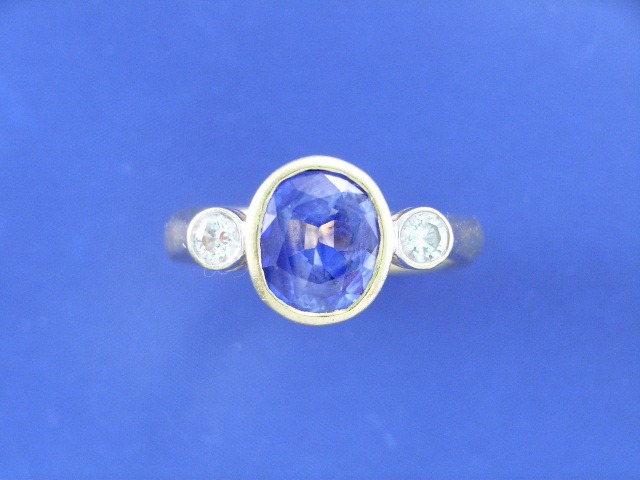 Appraisal: An ct gold estimated ct sapphire and two diamond set