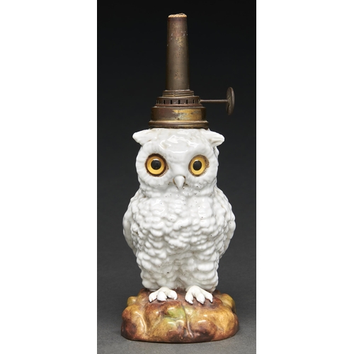 Appraisal: A Continental porcelain glass eyed owl oil lamp late th