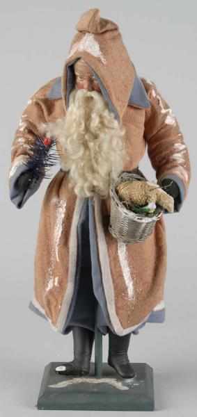 Appraisal: Reproduction Santa Description He has a composition face rabbit fur