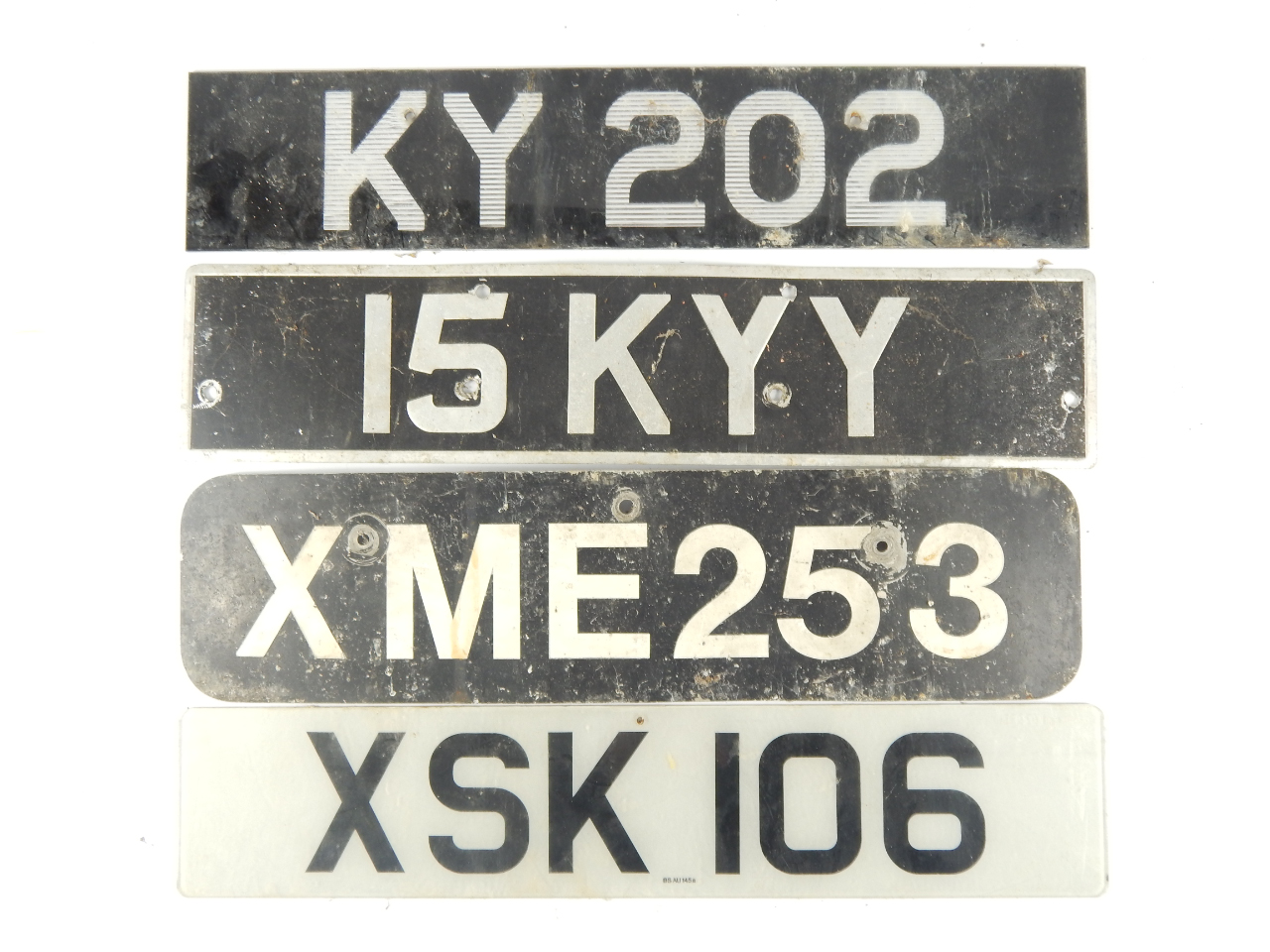 Appraisal: Four number plates not on retention comprising XSK XME KYY