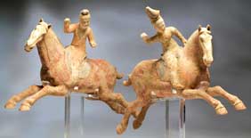 Appraisal: PAIR TANG POTTERY POLO PLAYERS Pair of unusally large Chinese