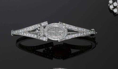 Appraisal: DIAMOND BANGLE ca White gold Elegant bangle the top is