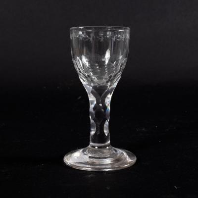 Appraisal: An th Century cordial glass with facet cut bowl and