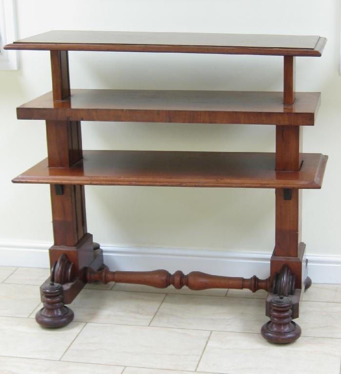 Appraisal: A Victorian mahogany three tier Dumb Waiter with rise and