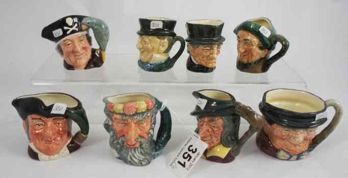 Appraisal: Royal Doulton Miniature Character Jugs Auld Mac D Micawber D