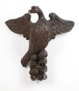 Appraisal: A carved wooden eagle th century possibly American carved in