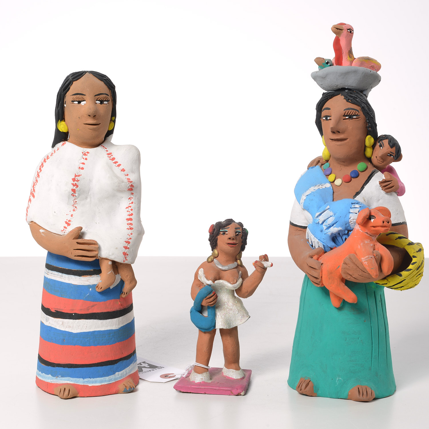 Appraisal: JOSEFINA AGUILAR PAINTED TERRACOTTA FIGURES th c Mexican female figures