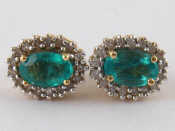 Appraisal: A pair of yellow metal tests carat gold emerald and