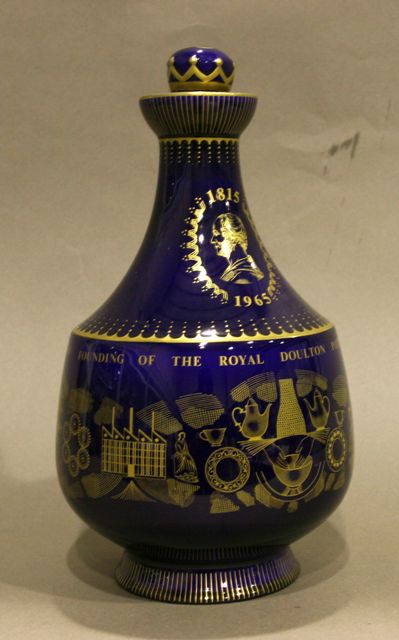 Appraisal: A Royal Doulton porcelain cobalt blue ground vase and cover