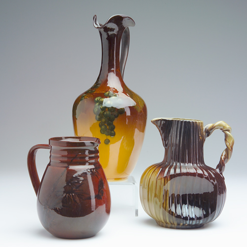 Appraisal: ROOKWOOD Three Standard glaze pitchers tallest by A M Valentien