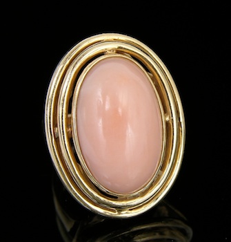 Appraisal: An Angel Skin Coral Dinner Ring A k yellow gold