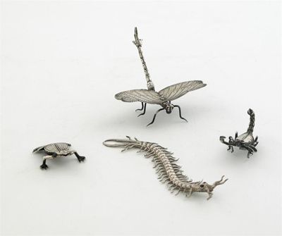 Appraisal: Four Indian novelty place card holders realistically modelled as the