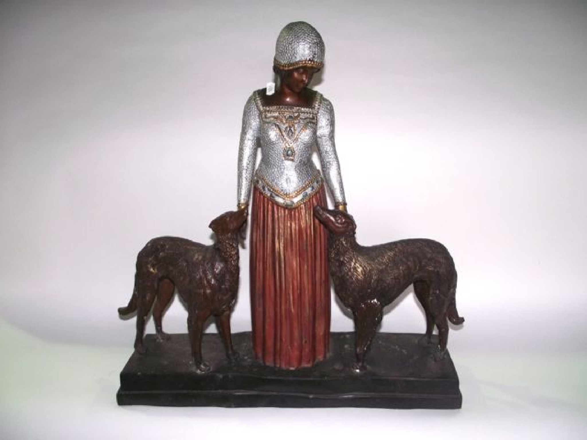 Appraisal: A painted cast metal study of a standing female figure