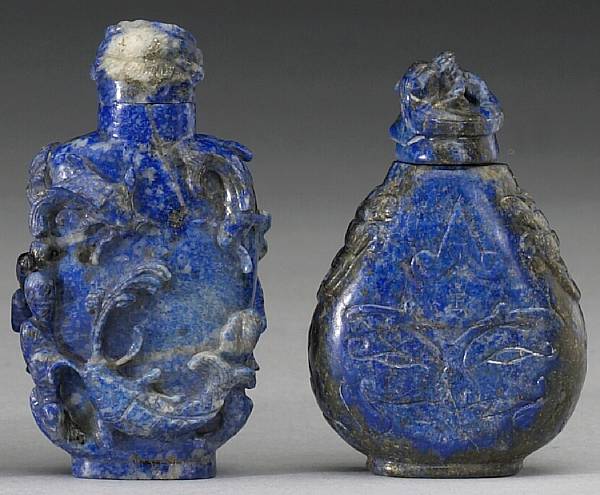 Appraisal: Two carved lapis lazuli snuff bottles Each side of the