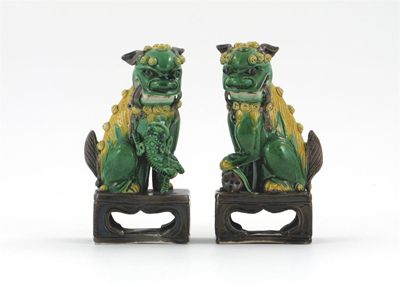 Appraisal: A pair of Chinese famille verte models of Buddhist lion