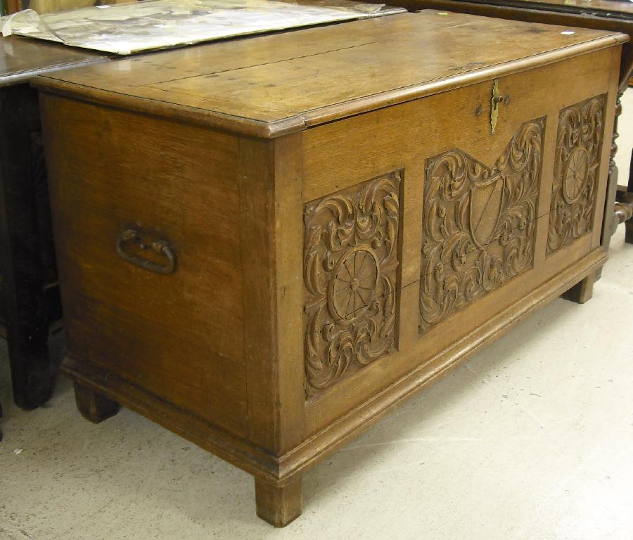 Appraisal: th century light oak coffer the moulded top over three