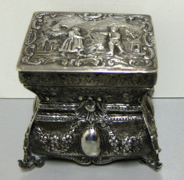 Appraisal: DUTCH SILVER TEA CADDY Footed casket form with hinged lid