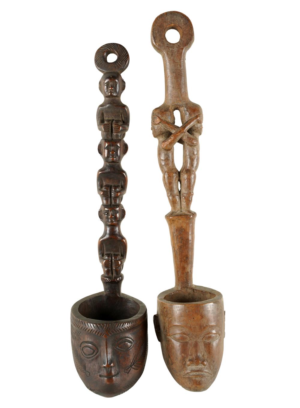 Appraisal: TWO AFRICAN WOOD CARVINGSunsigned each with a bowl carved with