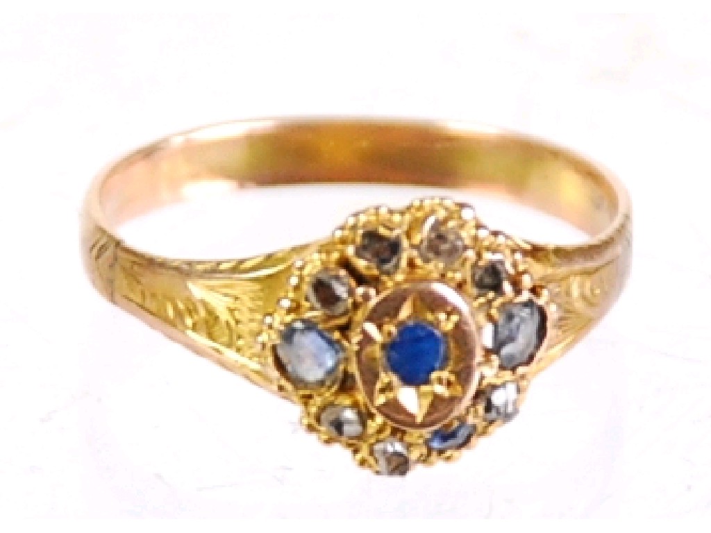 Appraisal: ANTIQUE GOLD RING set with an oval cluster of eleven