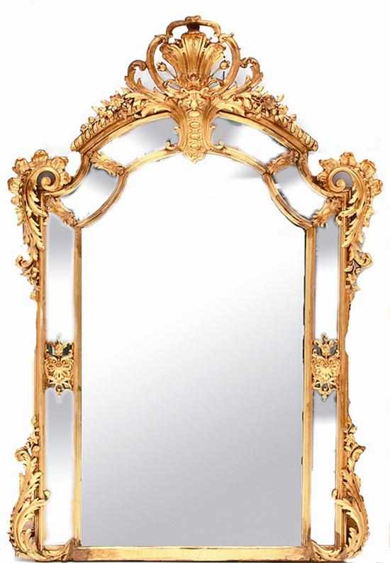 Appraisal: English Rococo style carved giltwood overmantel mirror mid th century