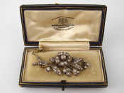 Appraisal: A Victorian high carat gold and silver diamond brooch of