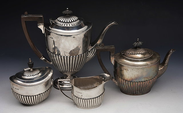 Appraisal: A MATCHED SILVER FOUR PIECE TEA AND COFFEE SERVICE of