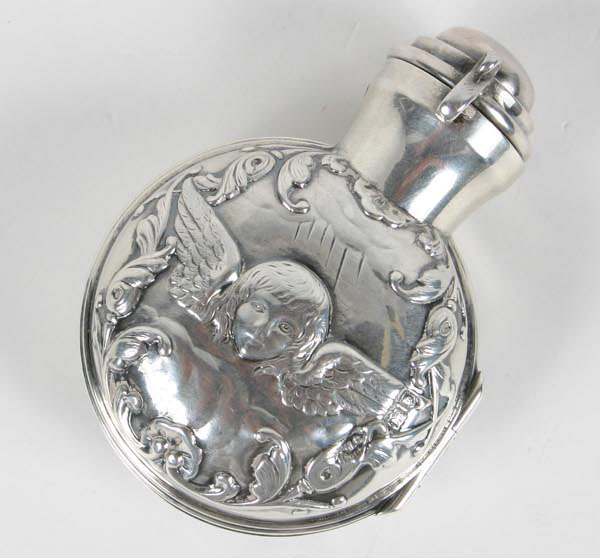 Appraisal: English sterling perfume bottle with green glass insert embossed cherubs