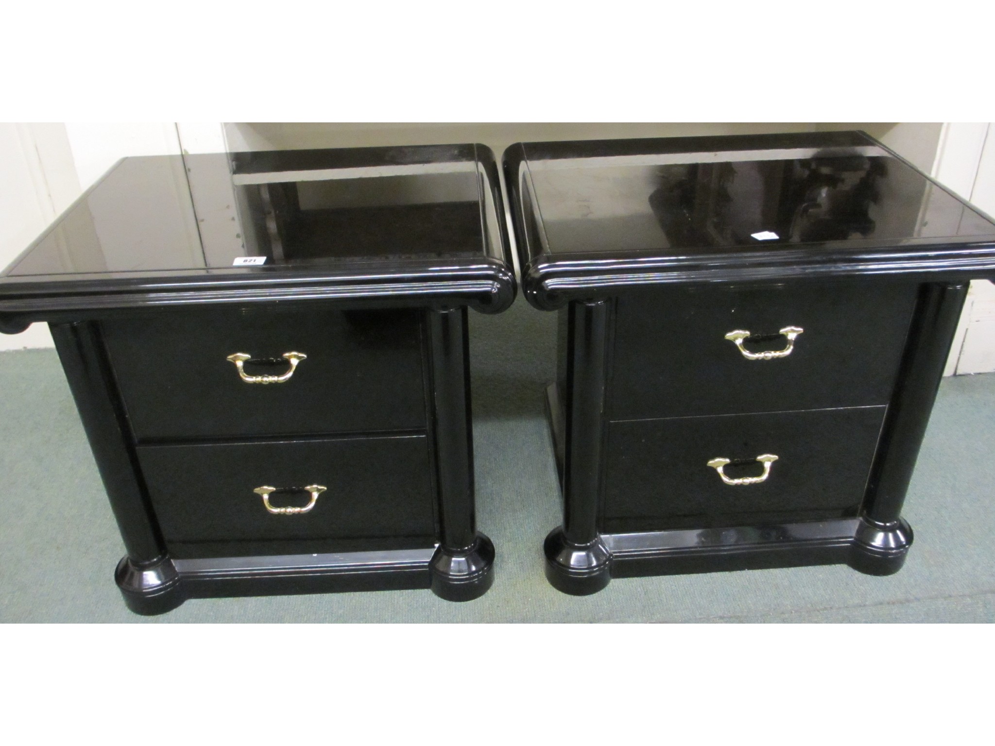 Appraisal: Pair of modern black lacquered bedside cabinets