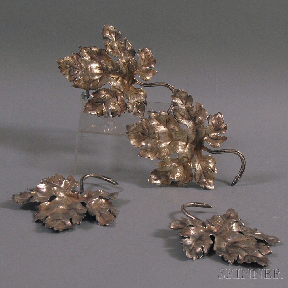 Appraisal: Set of Four Continental Silver Grape Leaf-form Table Decorations marked